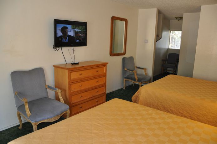 Imagen de la habitación del Hotel Cedar Inn and Suites. Foto 14