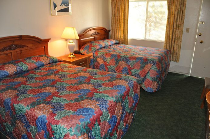 Imagen de la habitación del Hotel Cedar Inn and Suites. Foto 17
