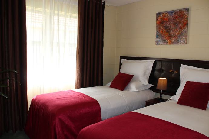 Imagen de la habitación del Hotel Cedar Lodge Motel Hamilton. Foto 8