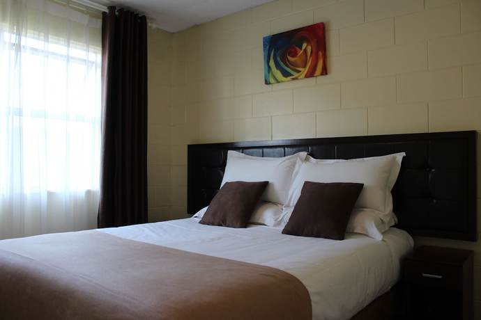 Imagen de la habitación del Hotel Cedar Lodge Motel Hamilton. Foto 12