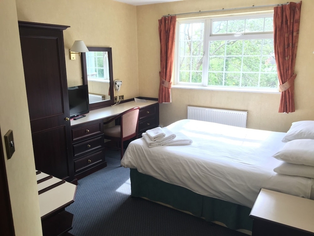 Imagen de la habitación del Hotel Cedar Tree. Foto 9