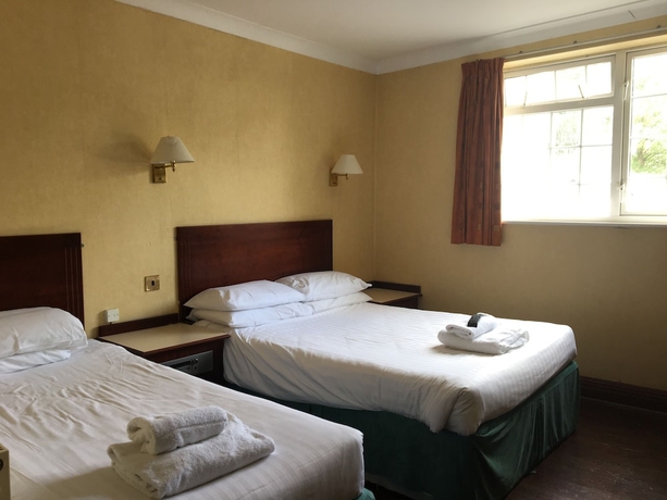 Imagen de la habitación del Hotel Cedar Tree. Foto 11