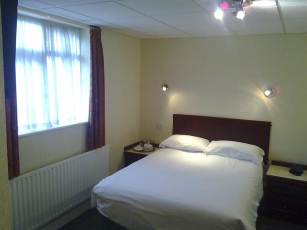 Imagen de la habitación del Hotel Cedar Tree. Foto 14