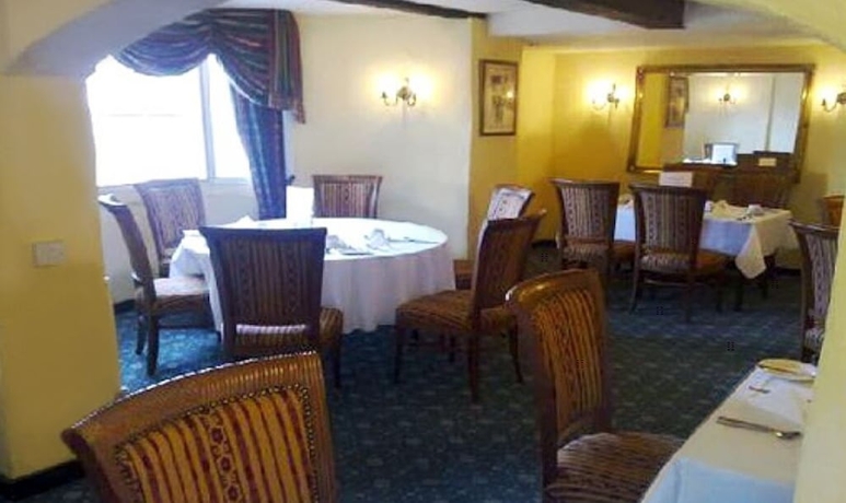 Imagen del bar/restaurante del Hotel Cedar Tree. Foto 2