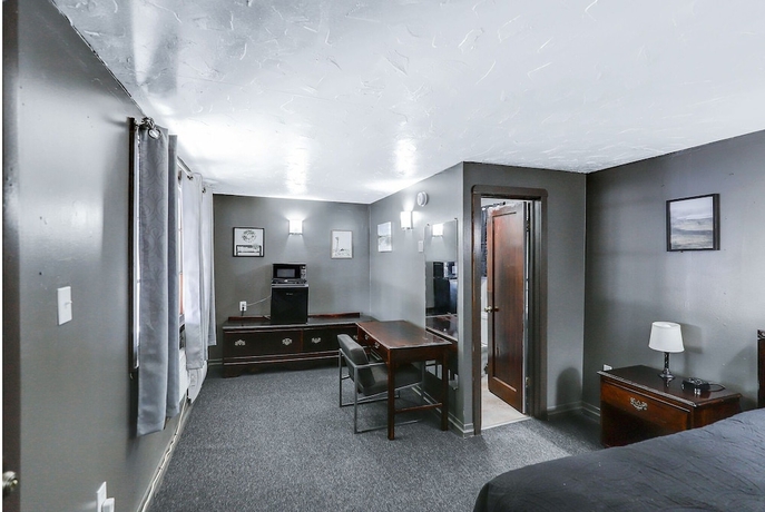 Imagen de la habitación del Hotel Cedar Village Motel. Foto 10