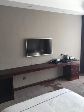 Imagen de la habitación del Hotel Cedar Wood Chengde. Foto 6