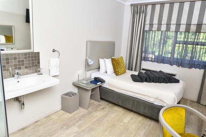 Imagen de la habitación del Hotel Cedarwoods Of Sandton. Foto 4