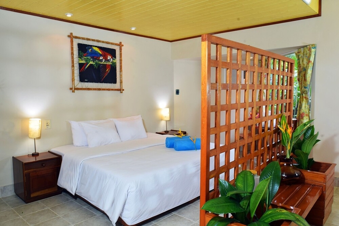 Imagen de la habitación del Hotel Ceiba Tops Lodge. Foto 10