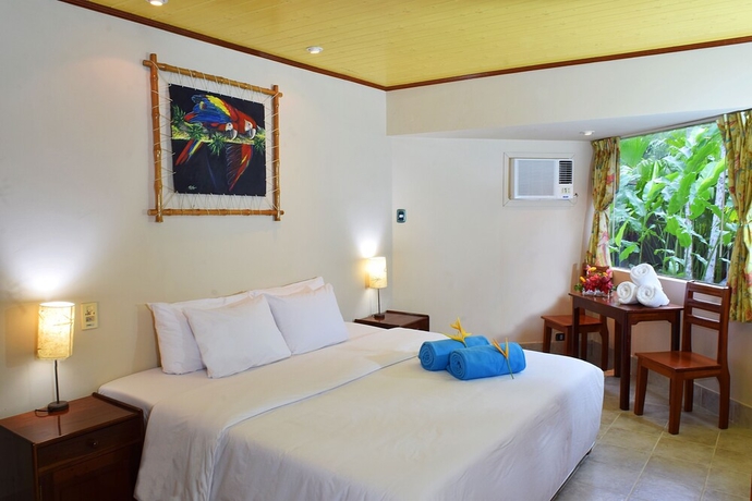 Imagen de la habitación del Hotel Ceiba Tops Lodge. Foto 14