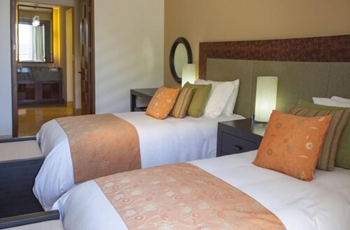 Imagen de la habitación del Hotel Celeste Beach Residences Huatulco Curamoria Collection. Foto 5