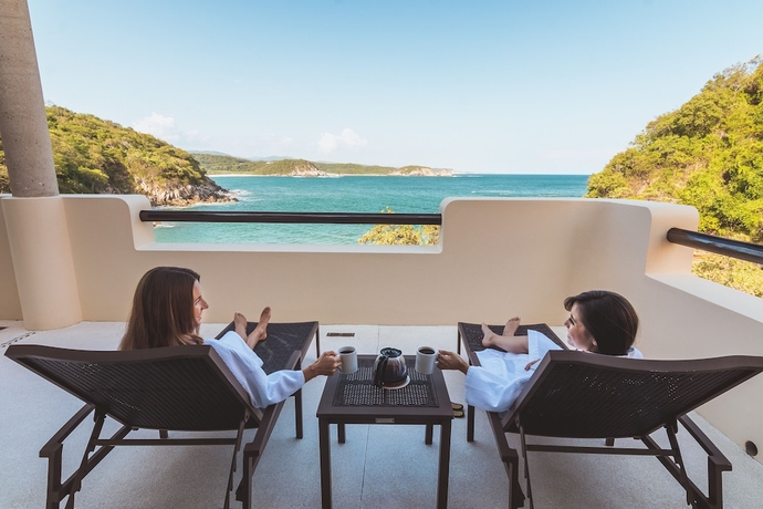 Imagen de la habitación del Hotel Celeste Beach Residences Huatulco Curamoria Collection. Foto 6