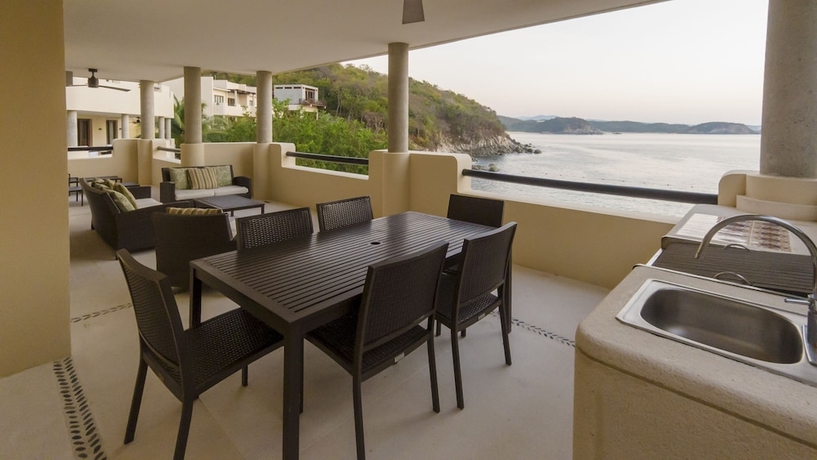 Imagen de la habitación del Hotel Celeste Beach Residences Huatulco Curamoria Collection. Foto 7