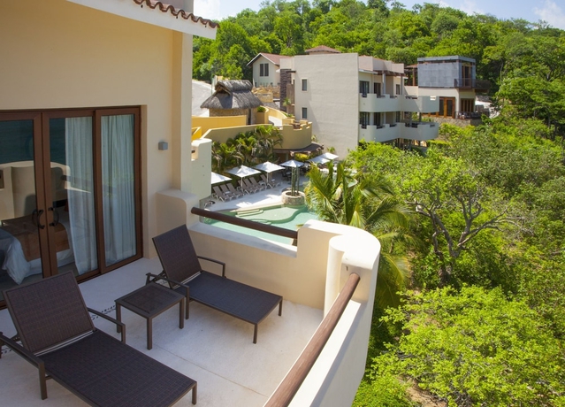 Imagen de la habitación del Hotel Celeste Beach Residences Huatulco Curamoria Collection. Foto 10