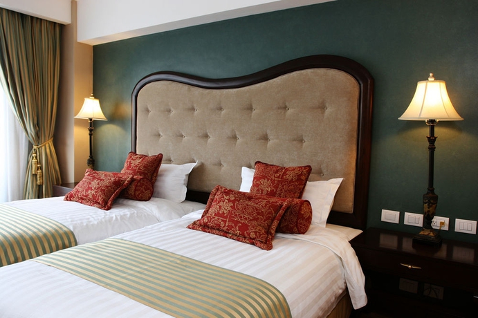 Imagen de la habitación del Hotel Celeste, Makati. Foto 3