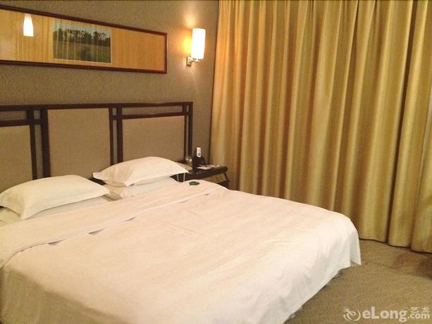 Imagen de la habitación del Hotel Celeste Palace International Hotel - Jiangmen. Foto 2