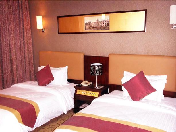 Imagen de la habitación del Hotel Celeste Palace International Hotel - Jiangmen. Foto 3