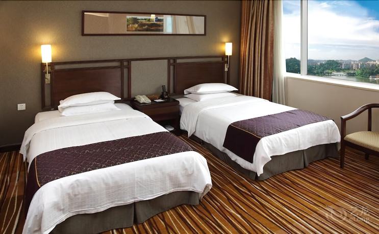 Imagen de la habitación del Hotel Celeste Palace International Hotel - Jiangmen. Foto 5