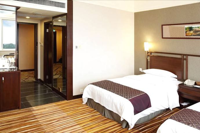 Imagen de la habitación del Hotel Celeste Palace International Hotel - Jiangmen. Foto 6