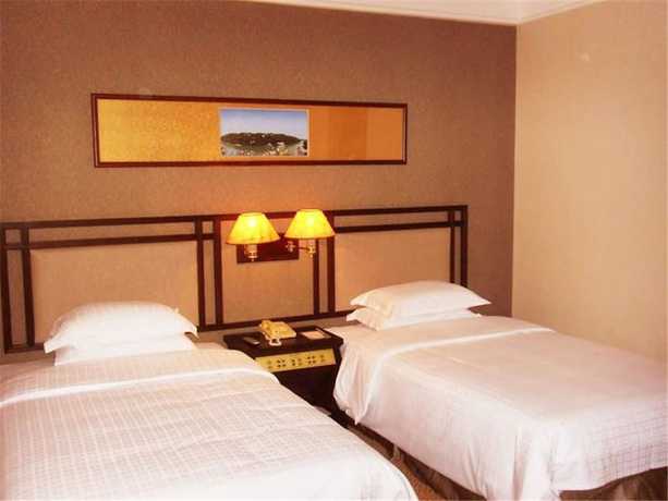 Imagen de la habitación del Hotel Celeste Palace International Hotel - Jiangmen. Foto 7