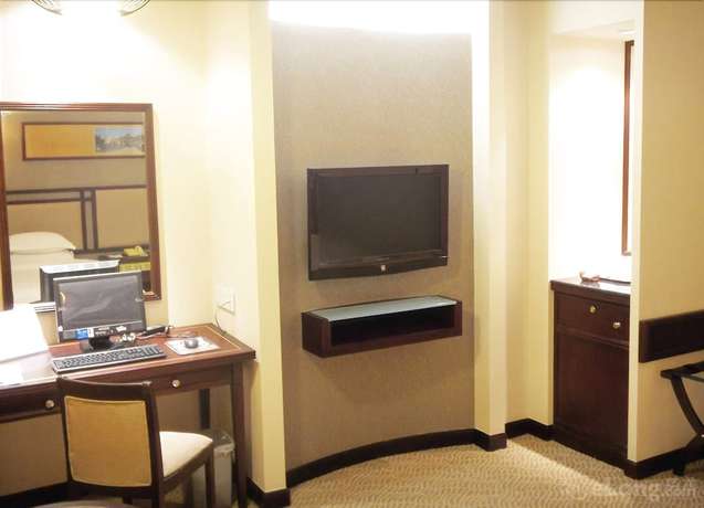 Imagen de la habitación del Hotel Celeste Palace International Hotel - Jiangmen. Foto 11