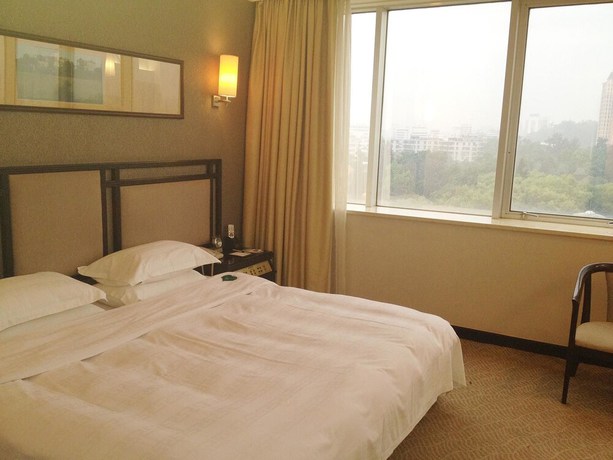 Imagen de la habitación del Hotel Celeste Palace International Hotel - Jiangmen. Foto 12