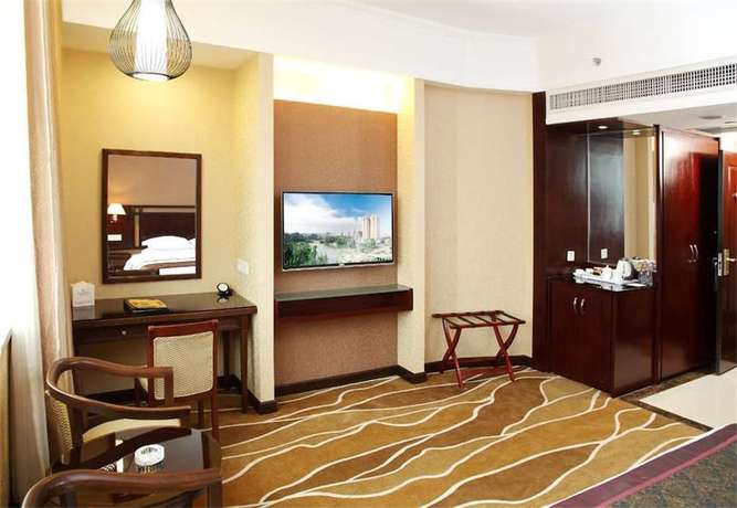 Imagen de la habitación del Hotel Celeste Palace International Hotel - Jiangmen. Foto 16