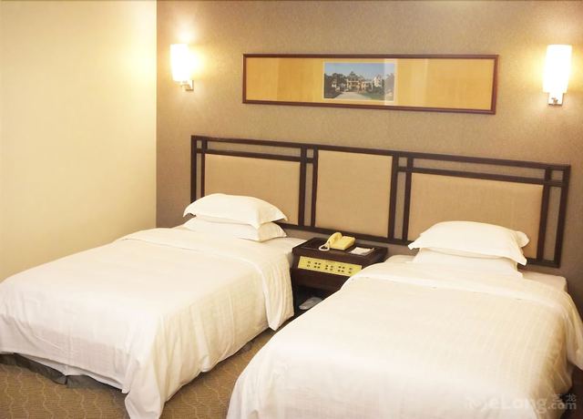 Imagen de la habitación del Hotel Celeste Palace International Hotel - Jiangmen. Foto 18