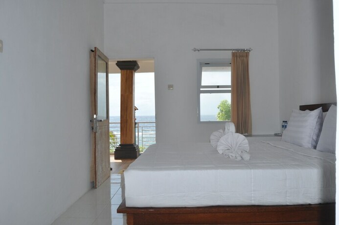 Imagen de la habitación del Hotel Cemara's Beach Homestay. Foto 3