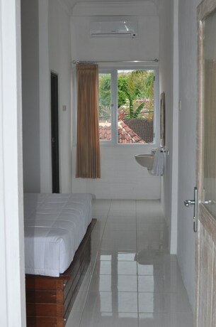 Imagen de la habitación del Hotel Cemara's Beach Homestay. Foto 8