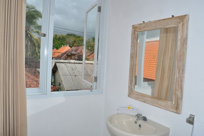 Imagen de la habitación del Hotel Cemara's Beach Homestay. Foto 11