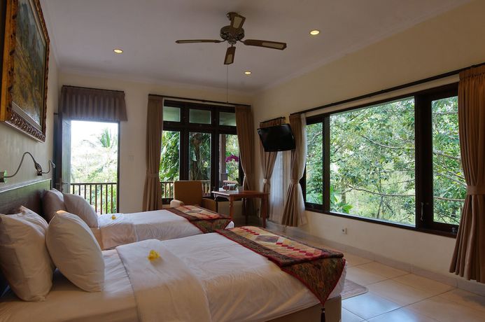 Imagen de la habitación del Hotel Cempaka Belimbing Villas. Foto 19
