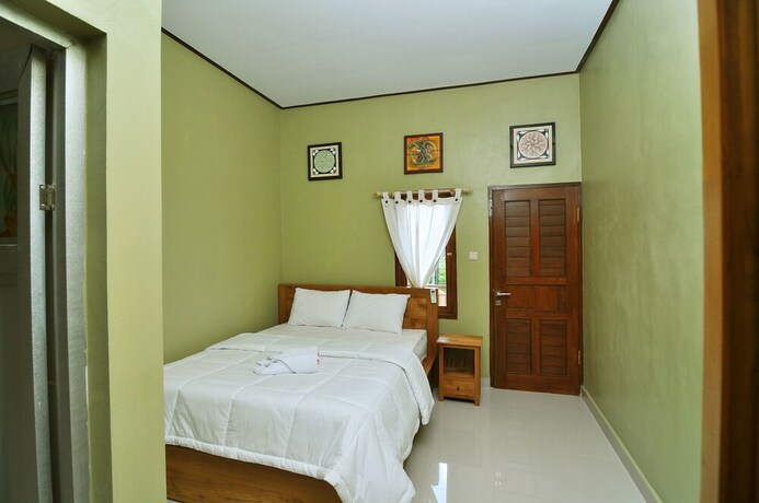 Imagen de la habitación del Hotel Cempaka Mas Guesthouse. Foto 20