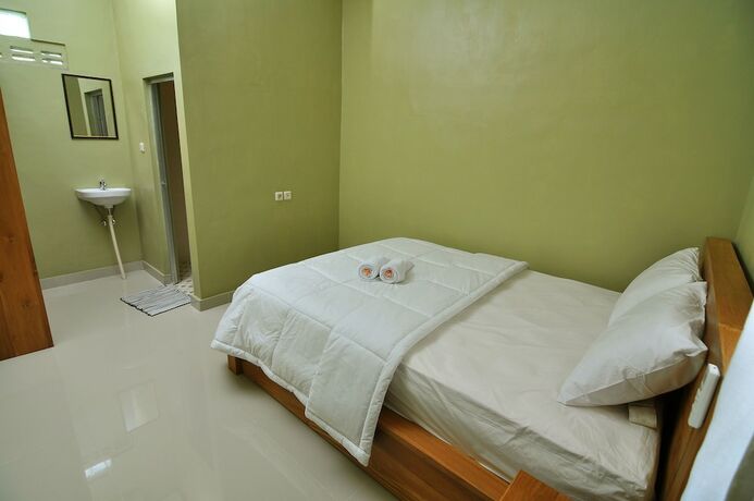 Imagen de la habitación del Hotel Cempaka Mas Guesthouse. Foto 21