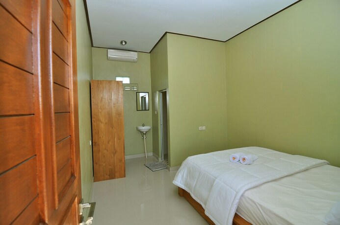 Imagen de la habitación del Hotel Cempaka Mas Guesthouse. Foto 24