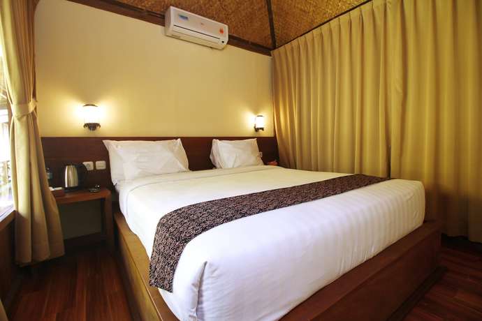 Imagen de la habitación del Hotel Cempaka Villa Borobudur. Foto 10