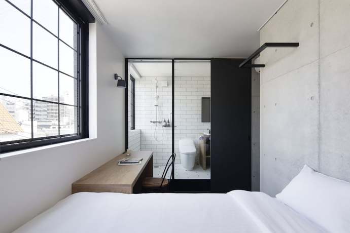 Imagen de la habitación del Hotel Cen. Foto 17