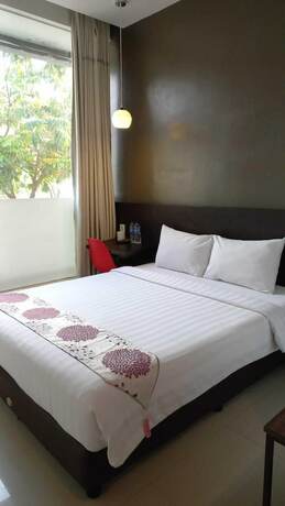 Imagen de la habitación del Hotel Cendana Co Living Solo Baru. Foto 9