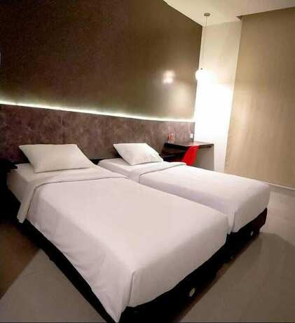 Imagen de la habitación del Hotel Cendana Co Living Solo Baru. Foto 10