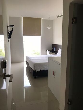Imagen de la habitación del Hotel Cendana Co Living Solo Baru. Foto 11