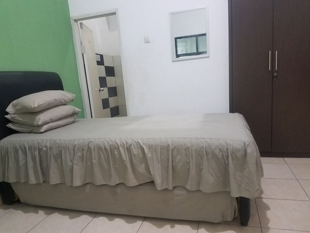 Imagen de la habitación del Hotel Cendrawasih Syariah Homestay. Foto 3
