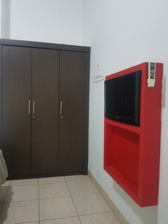 Imagen de la habitación del Hotel Cendrawasih Syariah Homestay. Foto 4