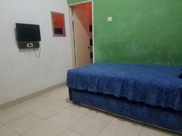 Imagen de la habitación del Hotel Cendrawasih Syariah Homestay. Foto 7