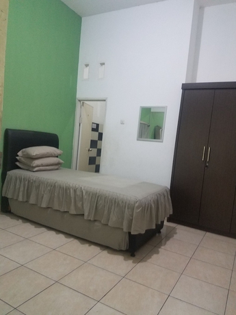 Imagen de la habitación del Hotel Cendrawasih Syariah Homestay. Foto 9