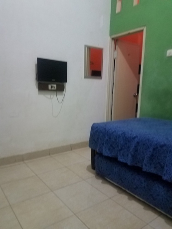 Imagen de la habitación del Hotel Cendrawasih Syariah Homestay. Foto 13