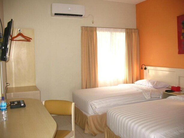 Imagen de la habitación del Hotel Cengkareng Transit. Foto 20