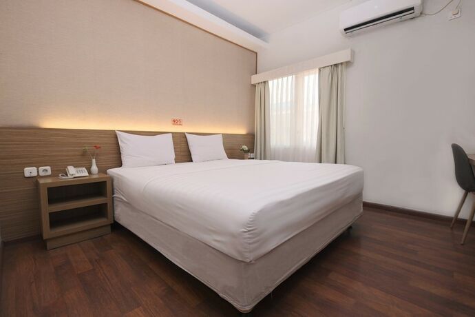 Imagen de la habitación del Hotel Cengkareng Transit. Foto 21