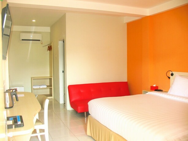 Imagen de la habitación del Hotel Cengkareng Transit. Foto 23