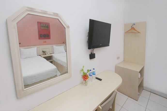 Imagen de la habitación del Hotel Cengkareng Transit. Foto 28
