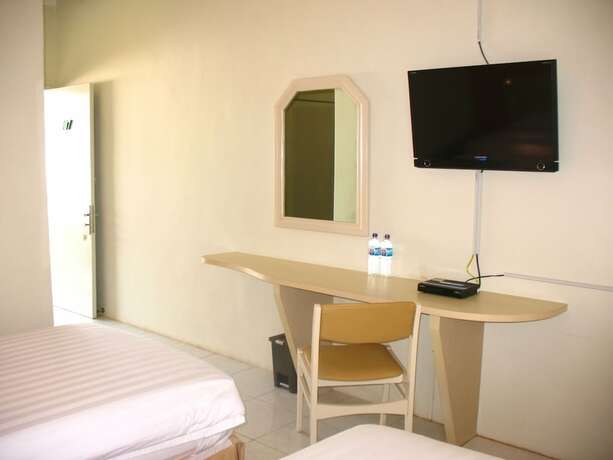 Imagen de la habitación del Hotel Cengkareng Transit. Foto 31