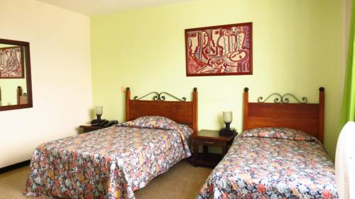 Imagen de la habitación del Hotel Centenario, Armenia. Foto 4